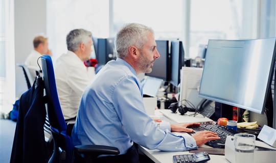 Rich At Desk